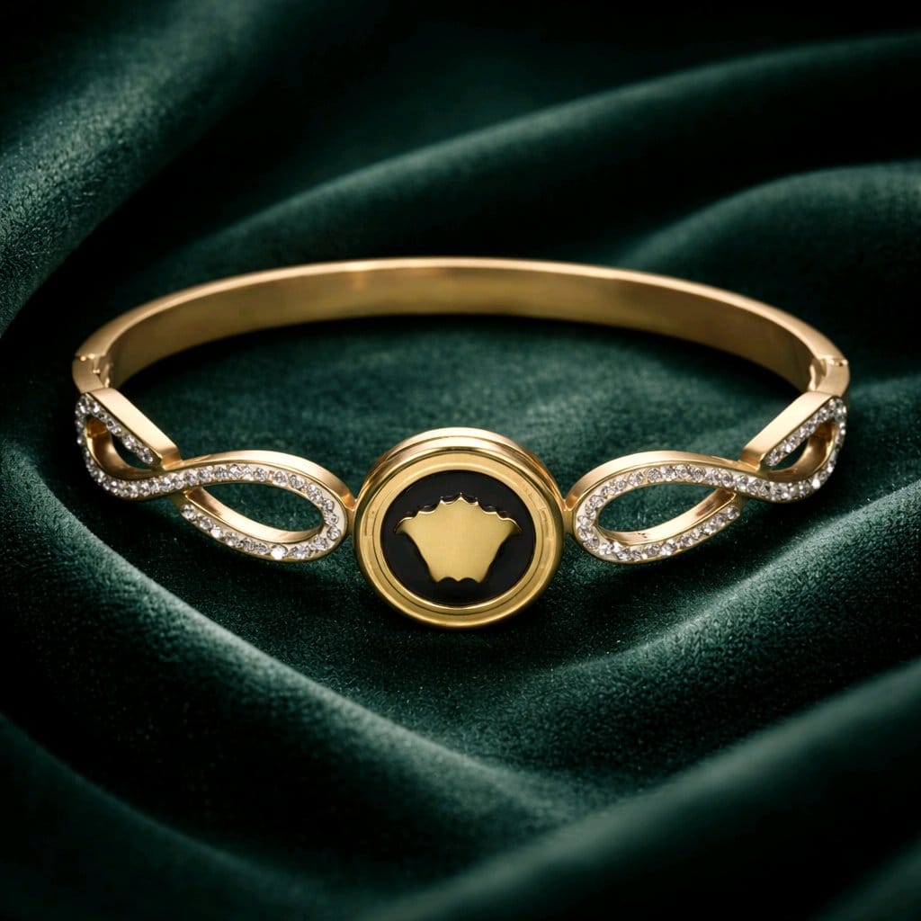 Aarvika Infinity Charm Gold Bracelet – close-up detail