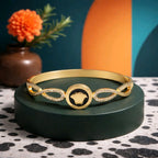 Aarvika Infinity Charm Gold Bracelet – side view