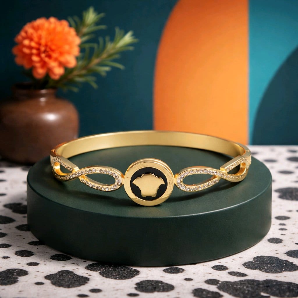 Aarvika Infinity Charm Gold Bracelet – side view