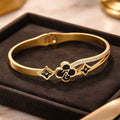 Aarvika Golden Black Charm Bracelet – front view