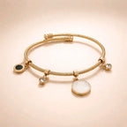 Aarvika Golden Charm Drop Bracelet – close-up detail