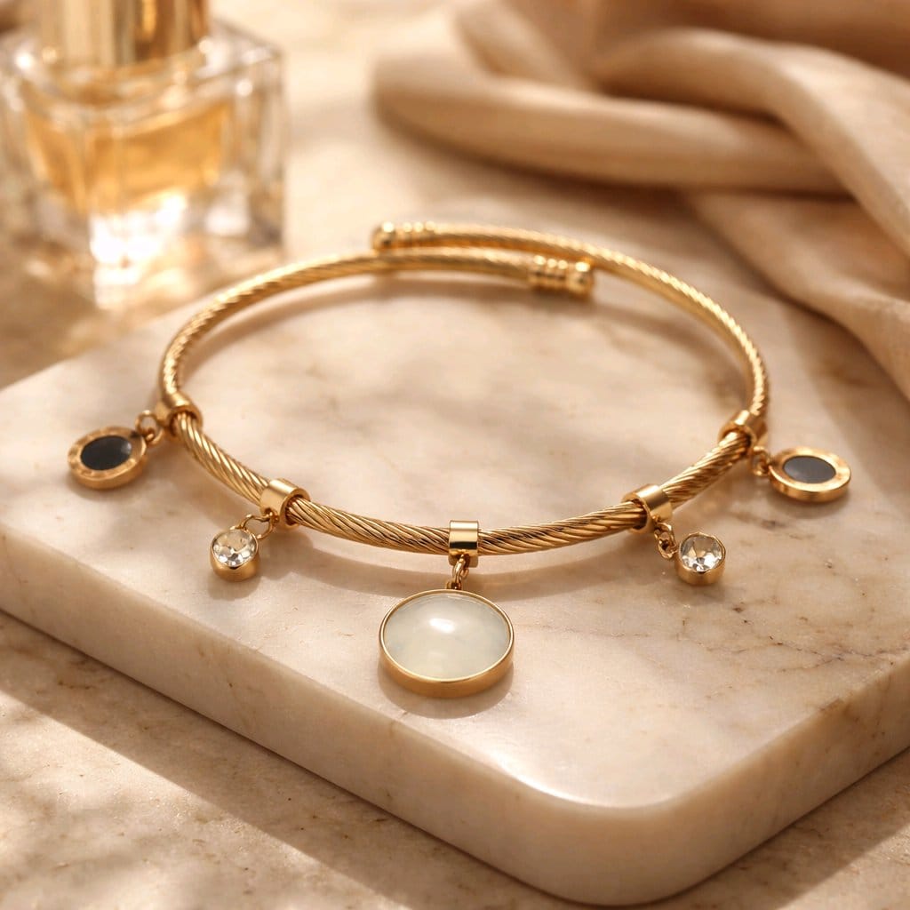 Aarvika Golden Charm Drop Bracelet – side view