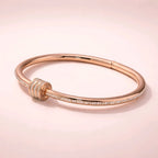 Aarvika CZ Crystal Rose Gold Crystal Knot Bracelet – model wearing