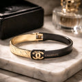 Aarvika Dual Tone Signature Cuff Bracelet – front view