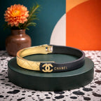 Aarvika Dual Tone Signature Cuff Bracelet – model wearing