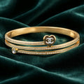 Aarvika CZ Crystal Golden Heart Crystal Line Bracelet – front view