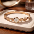 Aarvika Rose Gold Clover Wave Bracelet – side view