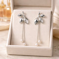 Aarvika Silver Leaf Pearl Drop Earrings – front view