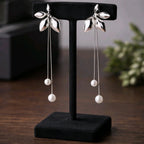 Aarvika Silver Leaf Pearl Drop Earrings – side view