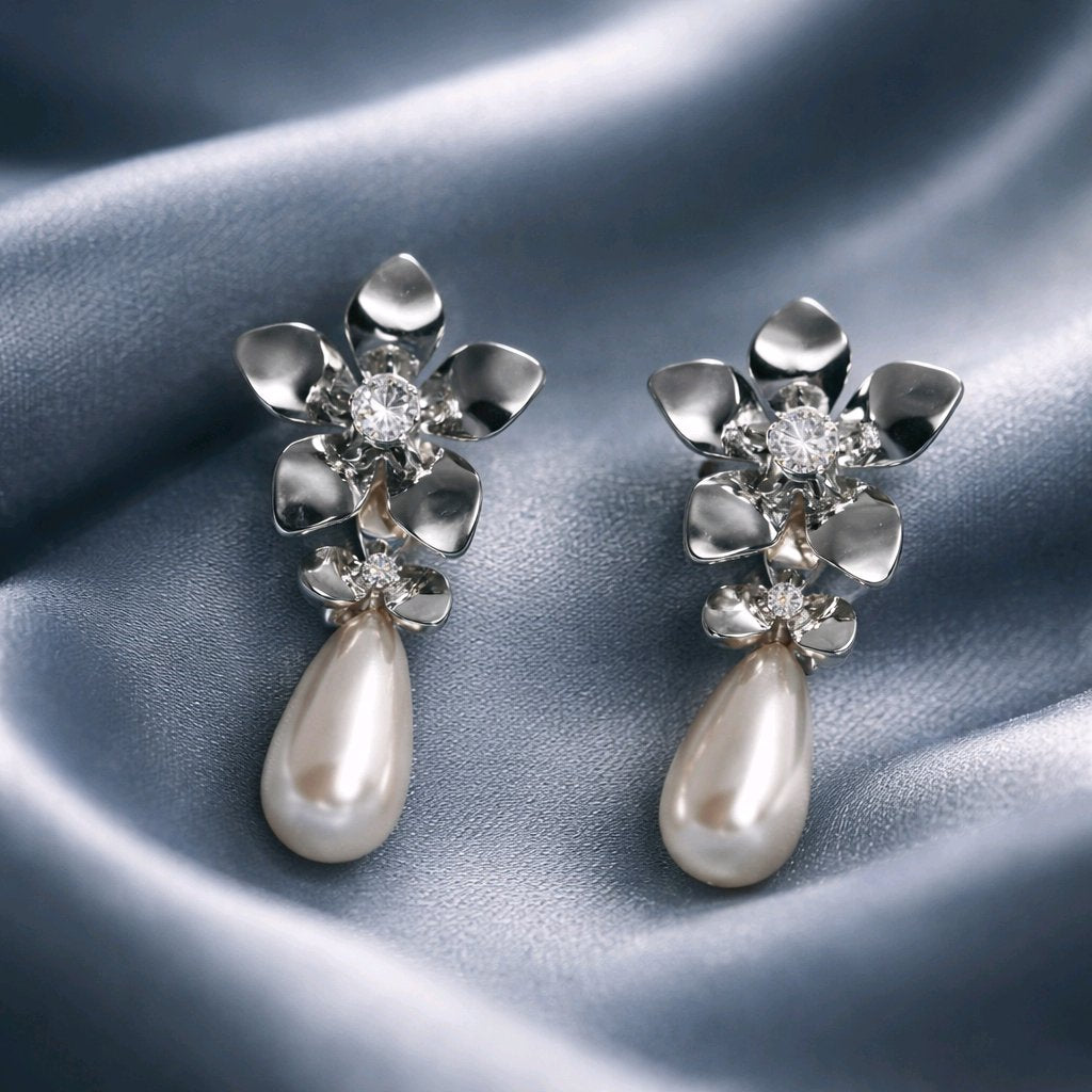 Aarvika Silver Floral Pearl Drop Earrings – flat lay