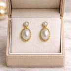Aarvika Gold Oval Pearl Drop Earrings – front view
