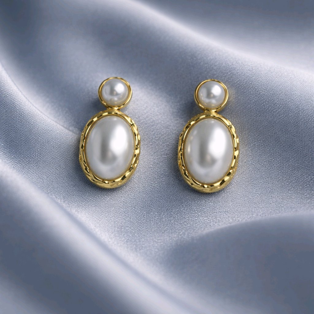 Aarvika Gold Oval Pearl Drop Earrings – flat lay