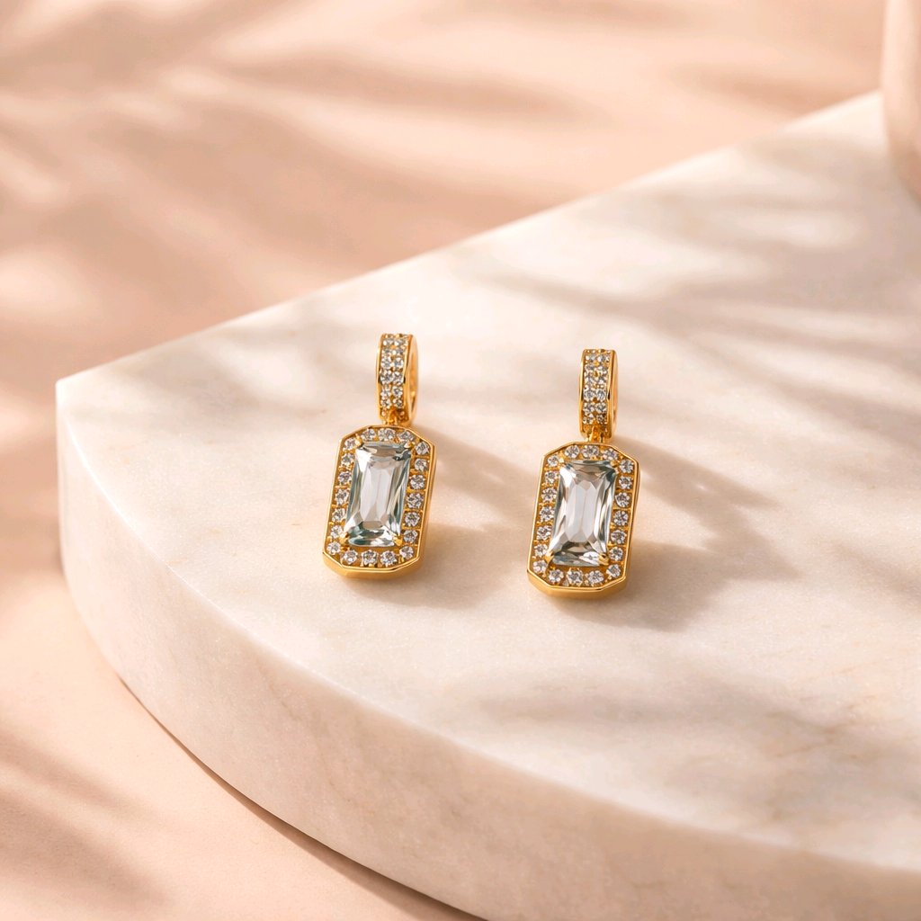 Aarvika CZ Crystal Gold Crystal Baguette Drop Earrings – flat lay
