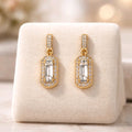 Aarvika CZ Crystal Gold Crystal Baguette Drop Earrings – front view