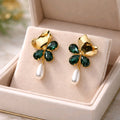 Aarvika Gold Clover Green Stone Pearl Drop Earrings – front view