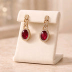 Aarvika CZ Crystal Gold Ruby Red Stone Drop Earrings – front view
