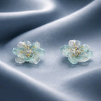 Aarvika CZ Crystal Sky-blue Floral Stud Earrings – side view