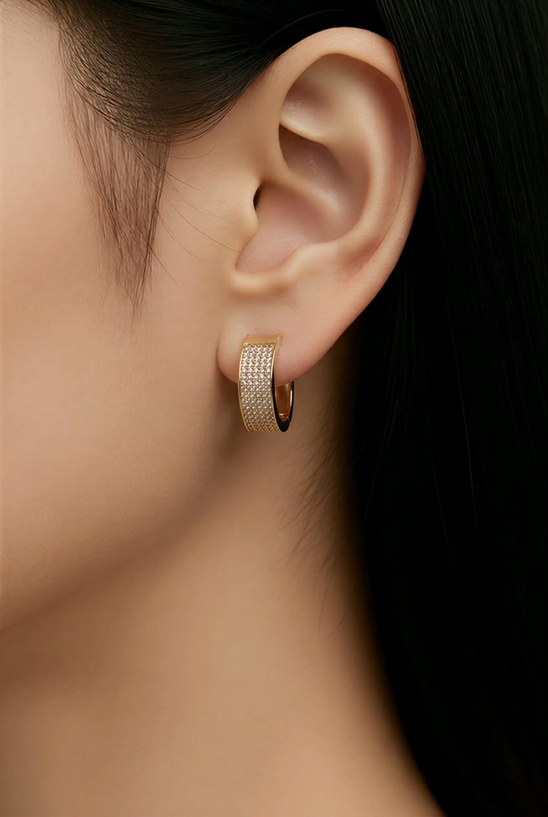 Aarvika CZ Crystal Gold CZ Studded Wide Hoop Earrings – model wearing