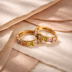 Aarvika CZ Crystal Gold Pastel CZ Huggie Hoop Earrings – flat lay