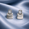 Aarvika CZ Crystal Silver Geometric CZ Drop Earrings – front view
