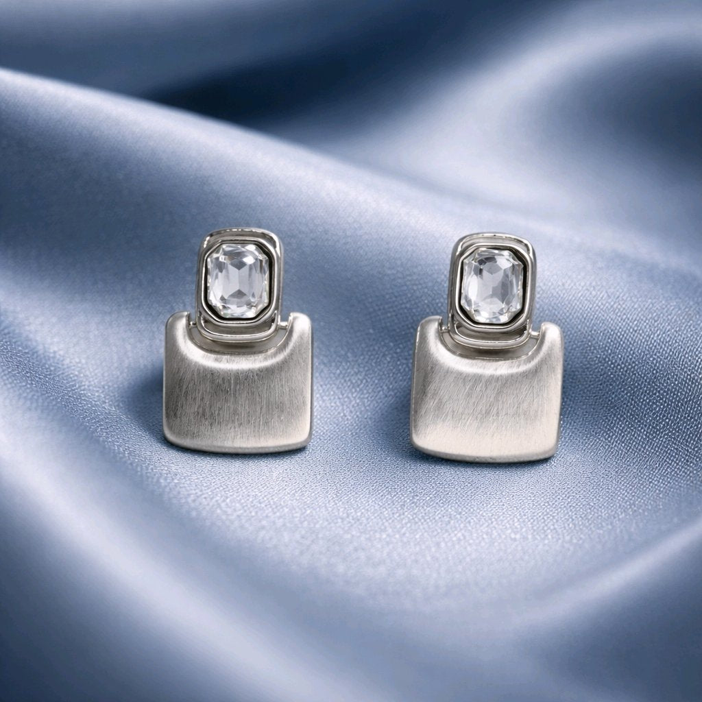 Aarvika CZ Crystal Silver Geometric CZ Drop Earrings – front view