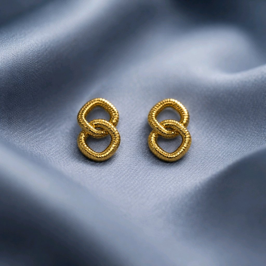 Aarvika Gold Interlinked Knot Stud Earrings – close-up detail