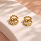 Aarvika Gold Interlinked Knot Stud Earrings – flat lay