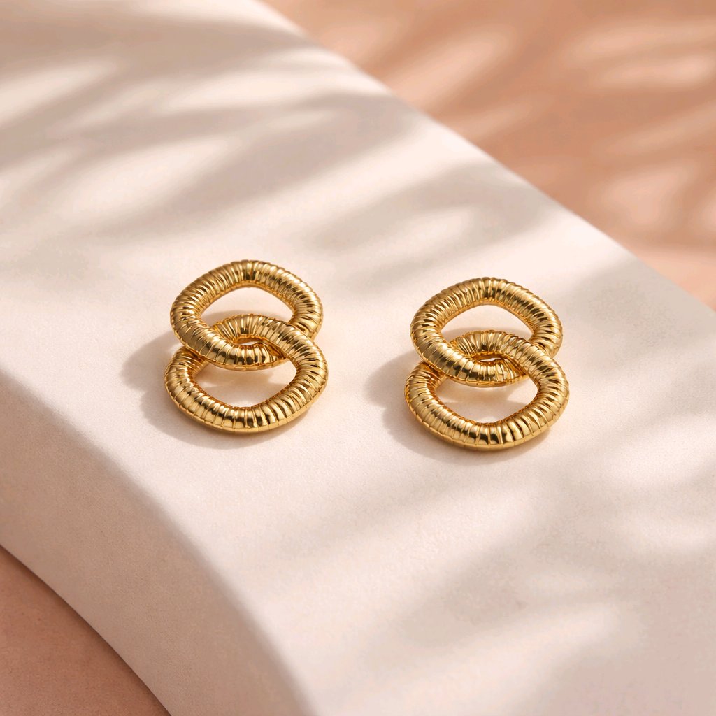Aarvika Gold Interlinked Knot Stud Earrings – flat lay