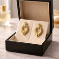 Aarvika Gold Textured Heart Drop Earrings – front view
