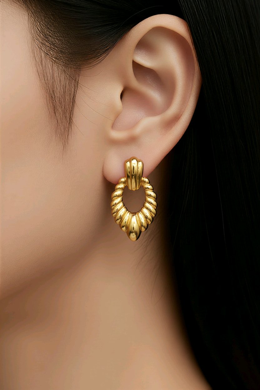 Aarvika Gold Textured Heart Drop Earrings – close-up detail