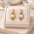 Aarvika Gold Abstract Pearl Drop Earrings – front view