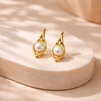 Aarvika Gold Abstract Pearl Drop Earrings – model wearing