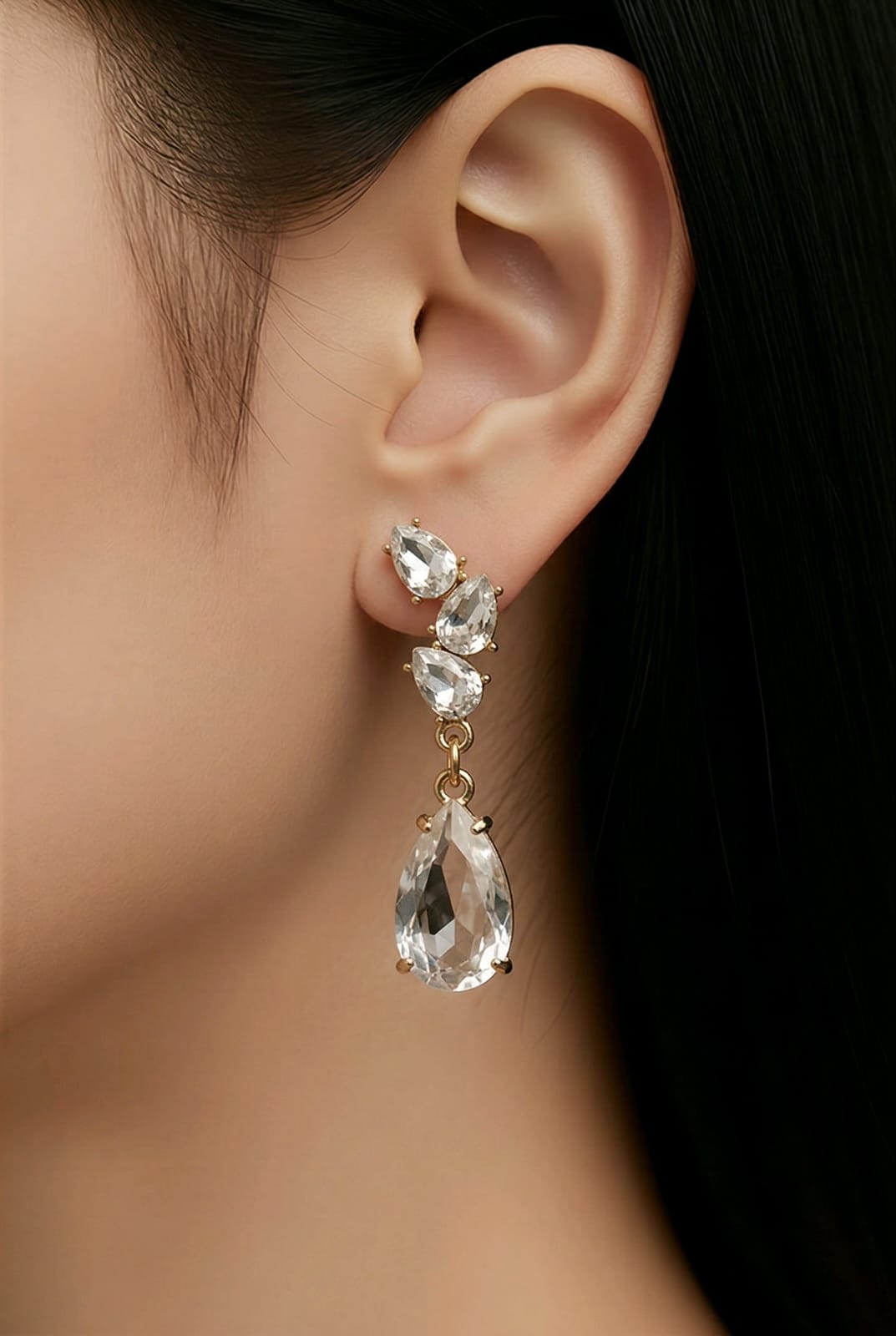 Aarvika CZ Crystal Crystal Teardrop Drop Earrings – model wearing