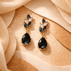 Aarvika CZ Crystal Black Teardrop Statement Earrings – model wearing