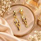 Aarvika Gold Tone Leaf Drop Earrings with Clear Crystal Accents