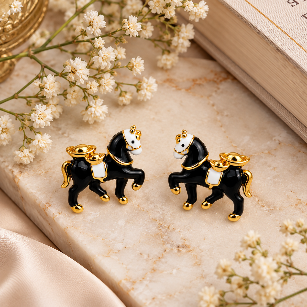 Aarvika Black Horse Stud Earrings with Gold Tone Detailing