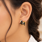 Aarvika Black Horse Stud Earrings with Gold Tone Detailing