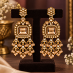 Aarvika Antique Gold Tone Long Dangler Earrings with Champagne Stone