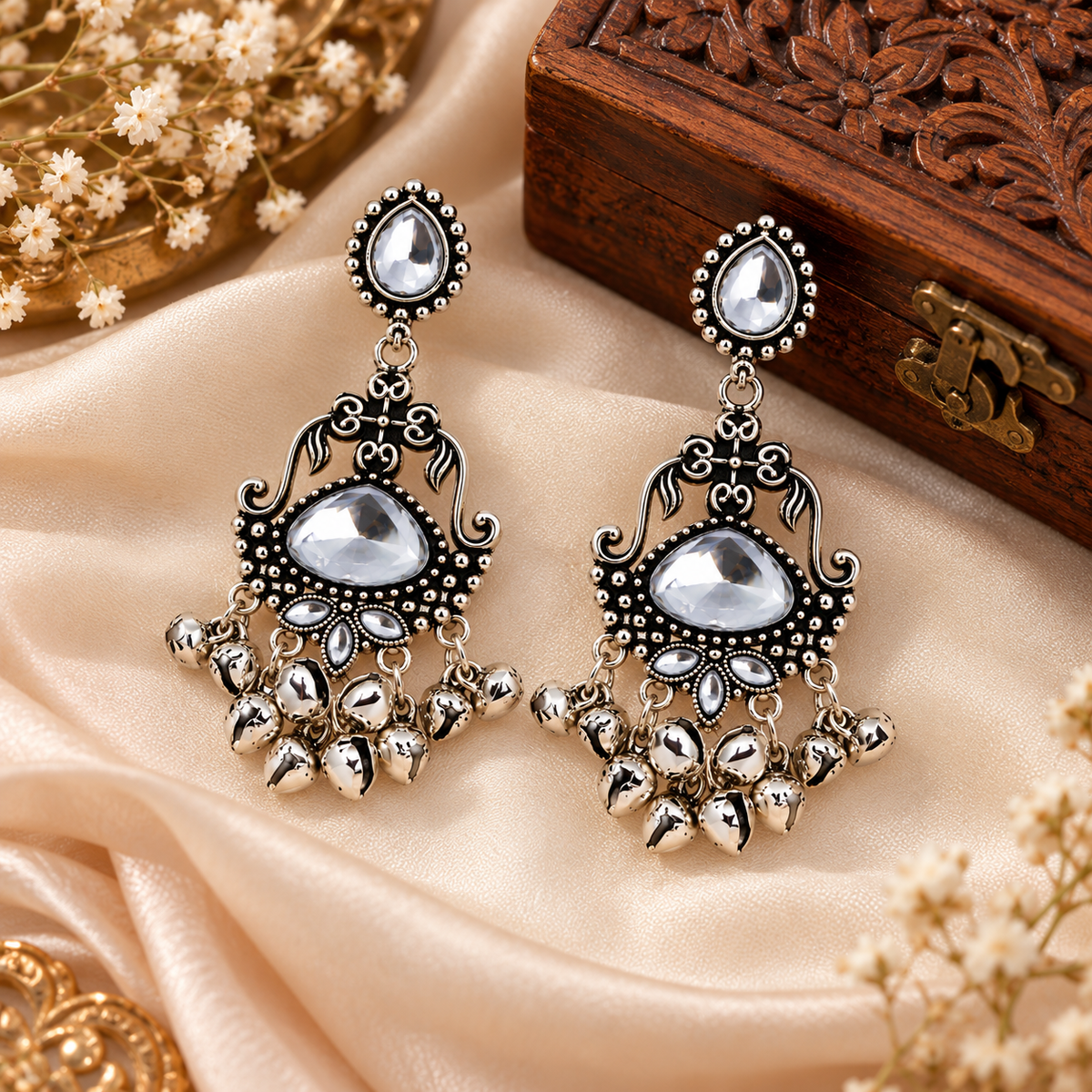 Aarvika Oxidized Silver Dangle Earrings with Clear Stone Work