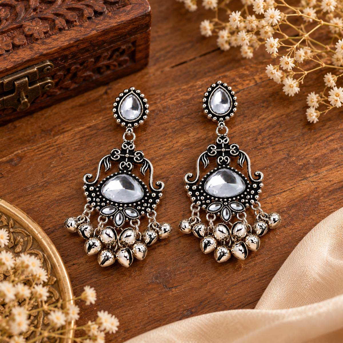 Aarvika Oxidized Silver Dangle Earrings with Clear Stone Work