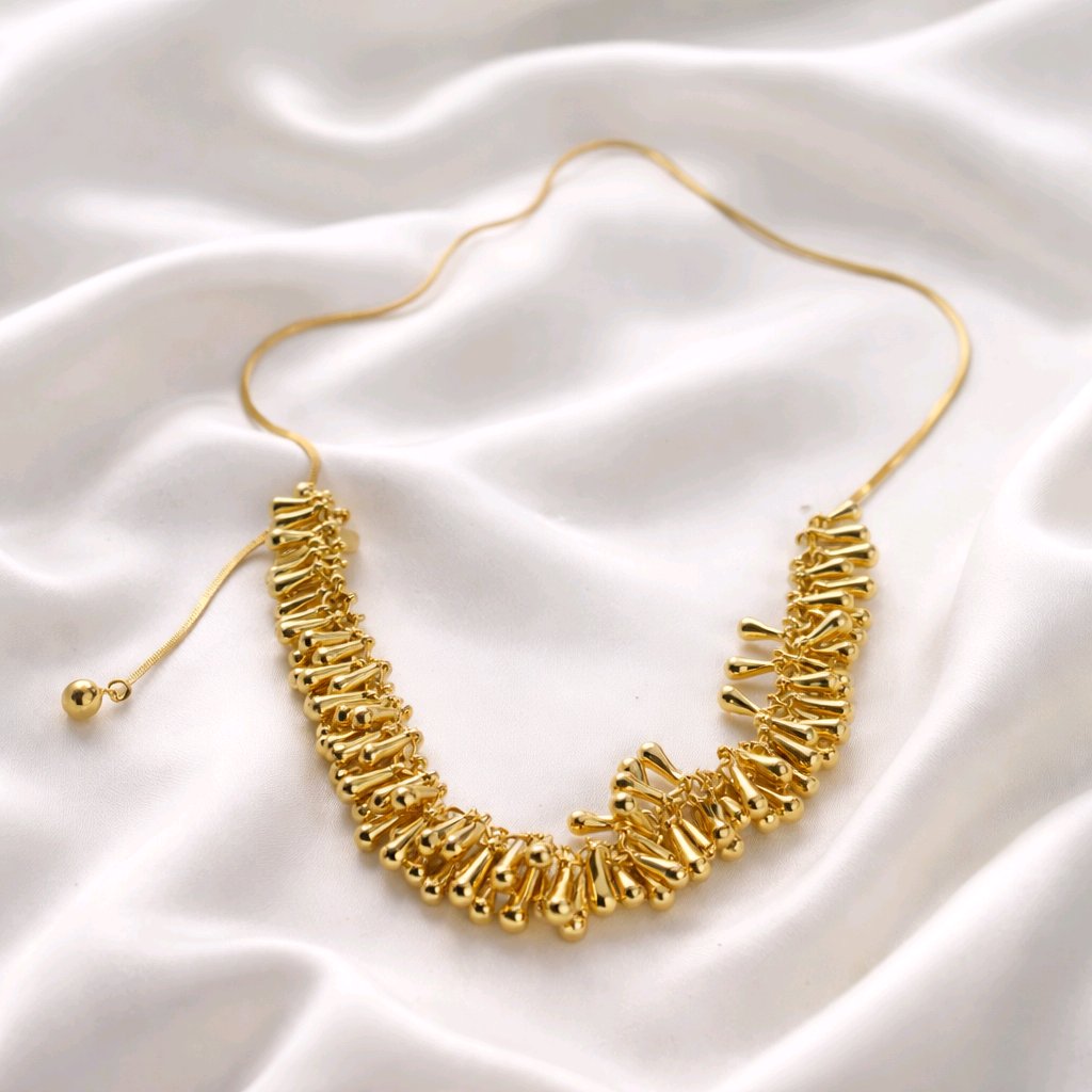 Aarvika Gold-Plated Luxe Droplet Fringe Necklace – flat lay