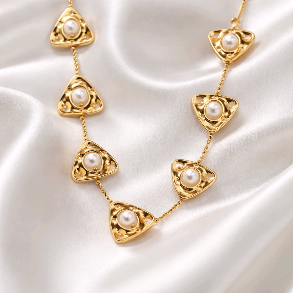 Aarvika Luxe Golden Pearl Triangle Statement Necklace – flat lay