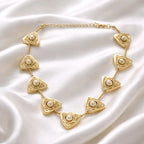 Aarvika Luxe Golden Pearl Triangle Statement Necklace – close-up detail