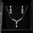 Aarvika CZ Crystal Luxe Infinity Crystal Drop Necklace & Earrings Set – model wearing