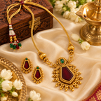 Aarvika Gold-Tone Traditional Necklace Set with Red Green Stones