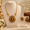Aarvika Antique Gold Tone Lakshmi Pendant Necklace Set