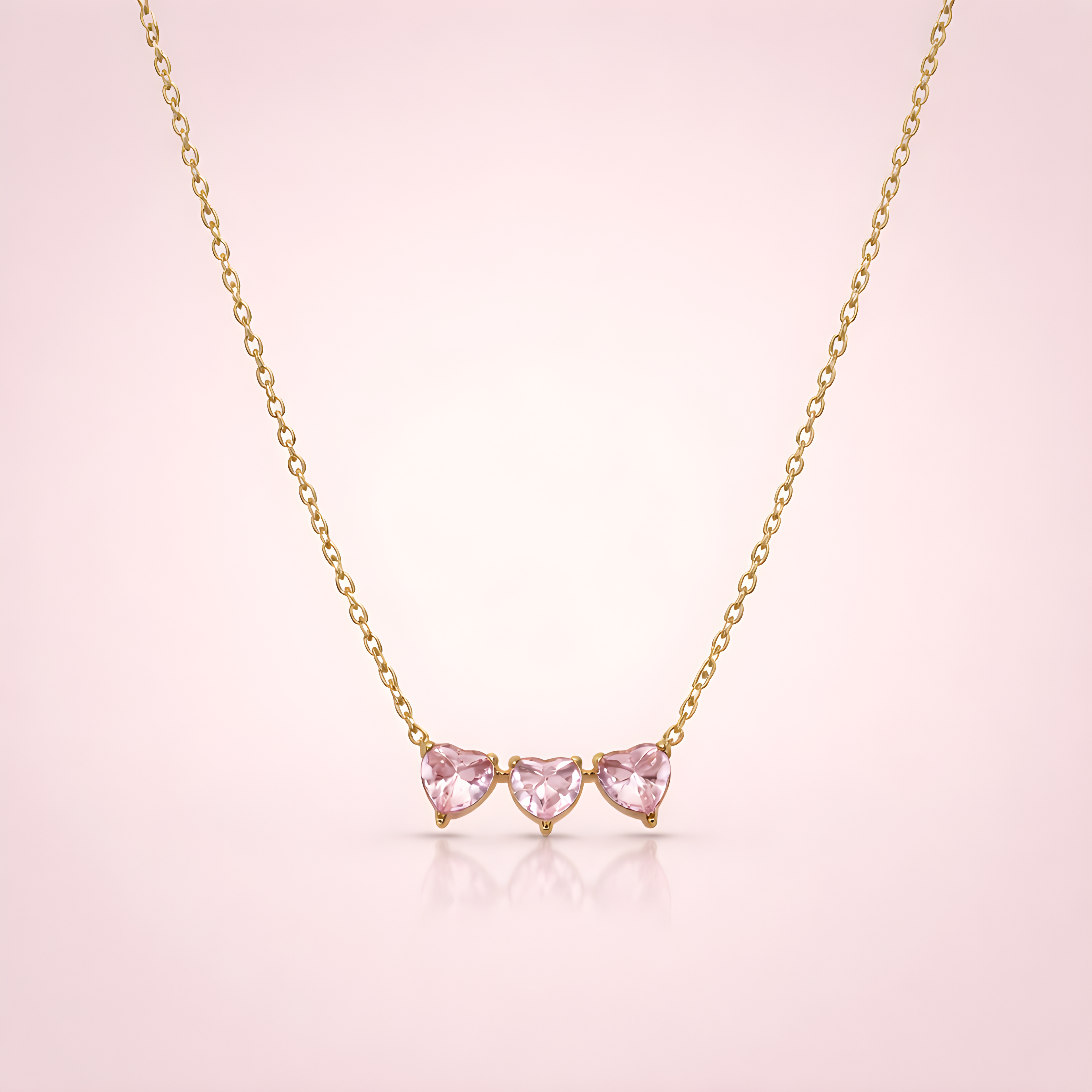 Aarvika 22K Gold-Plated Triple Pink Heart Necklace – side view