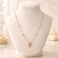 Aarvika CZ Crystal 22K Gold-Plated Crystal Ribbon Pendant Necklace – front view