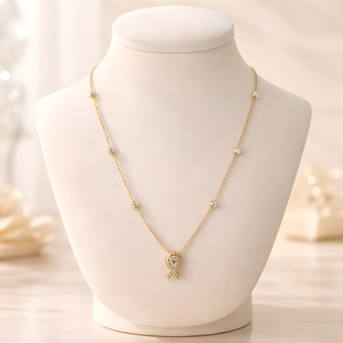 Aarvika CZ Crystal 22K Gold-Plated Crystal Ribbon Pendant Necklace – front view