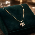 Aarvika CZ Crystal 22K Gold-Plated Floral Crystal Pendant Necklace – front view